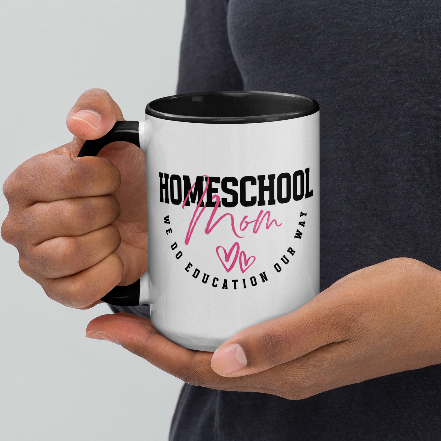 Woman holding a 'Homeschool Mom' 15oz white mug with black handle